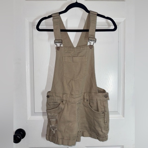 320 Dollhouse Tan Distressed Short Overalls - Picture 1 of 5